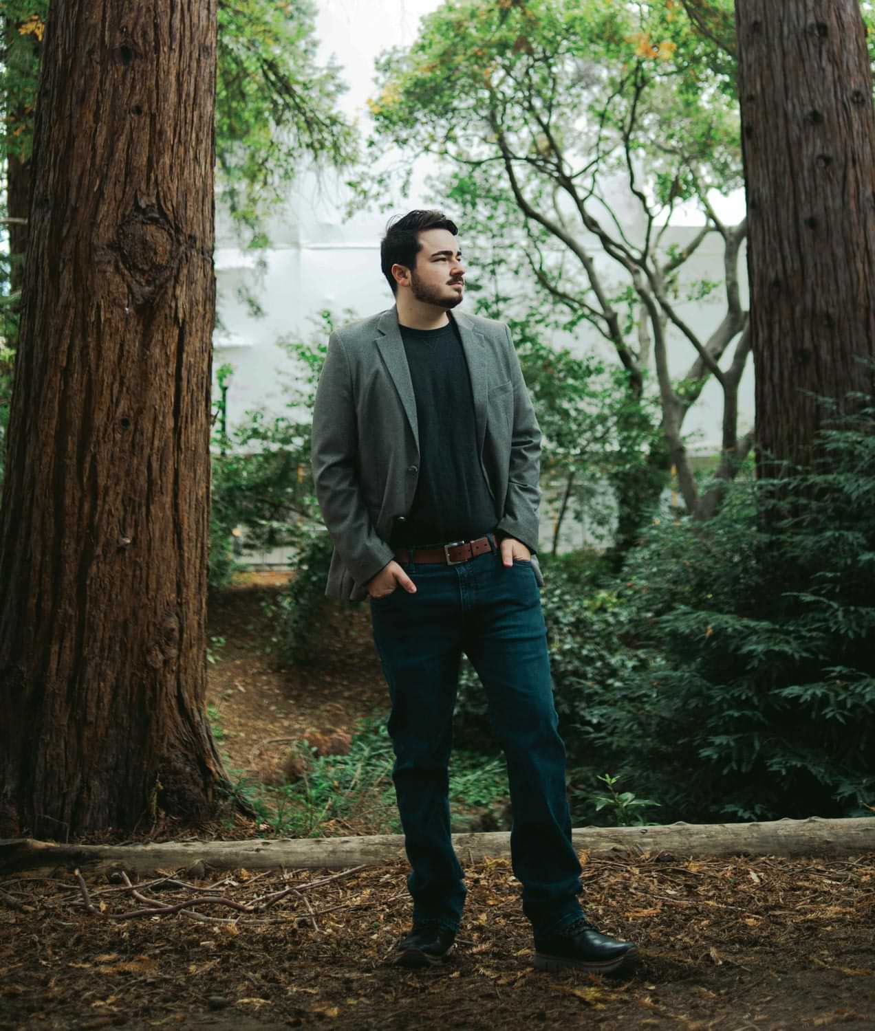 Phillip Gomez pictured standing in a forested area