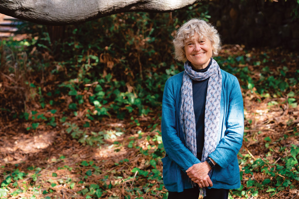 photo of Kathryn Abrams with nature behind