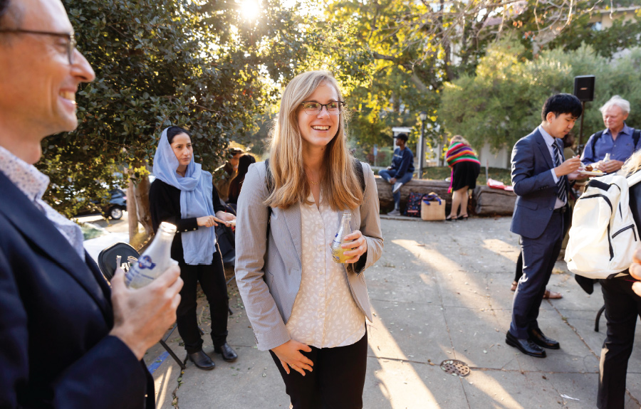 Anna Judson standing in outside corridor